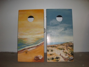 Custom cornhole boards with wrap around paint job from the front